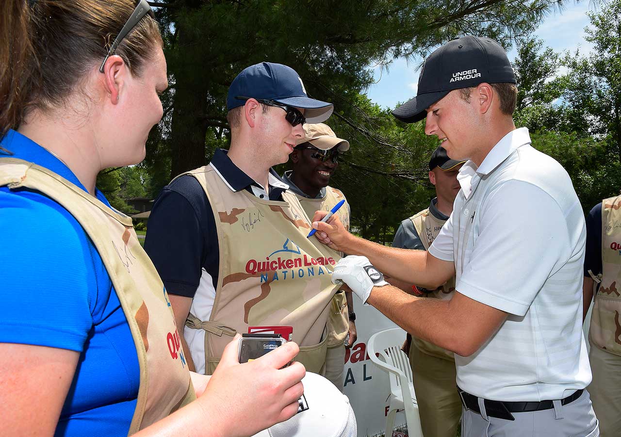 Jordan Spieth signs military caddie bibs