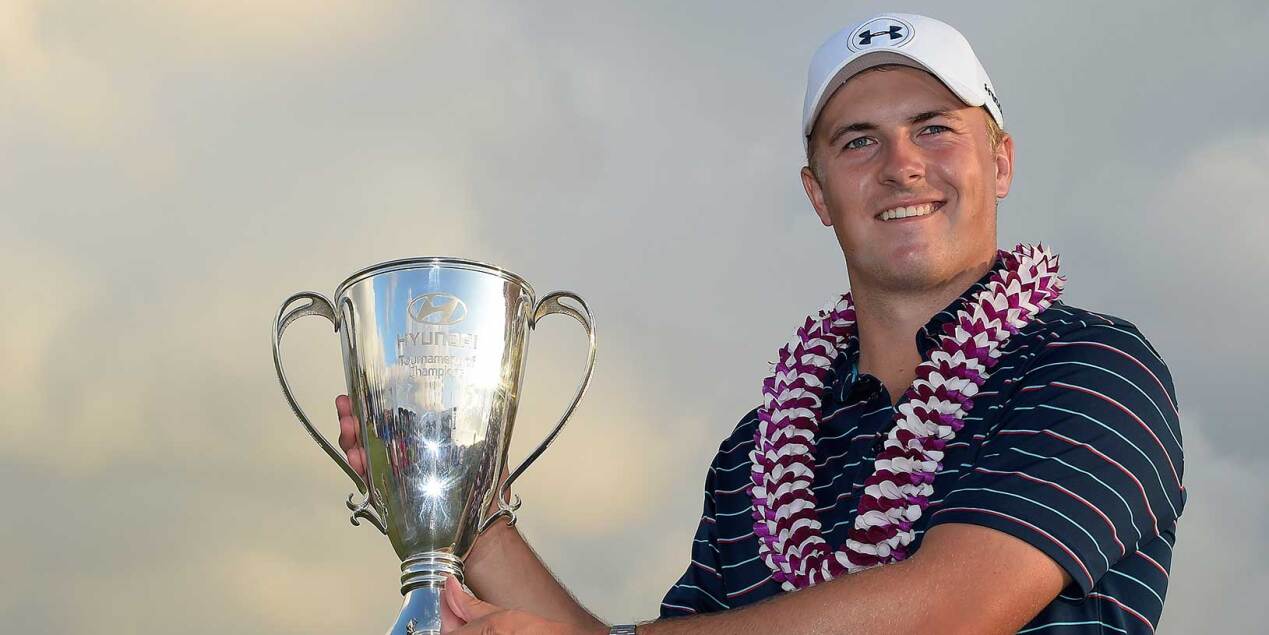 Jordan Poses With the Winner Trophy at the Hyundai Tournament of Champions